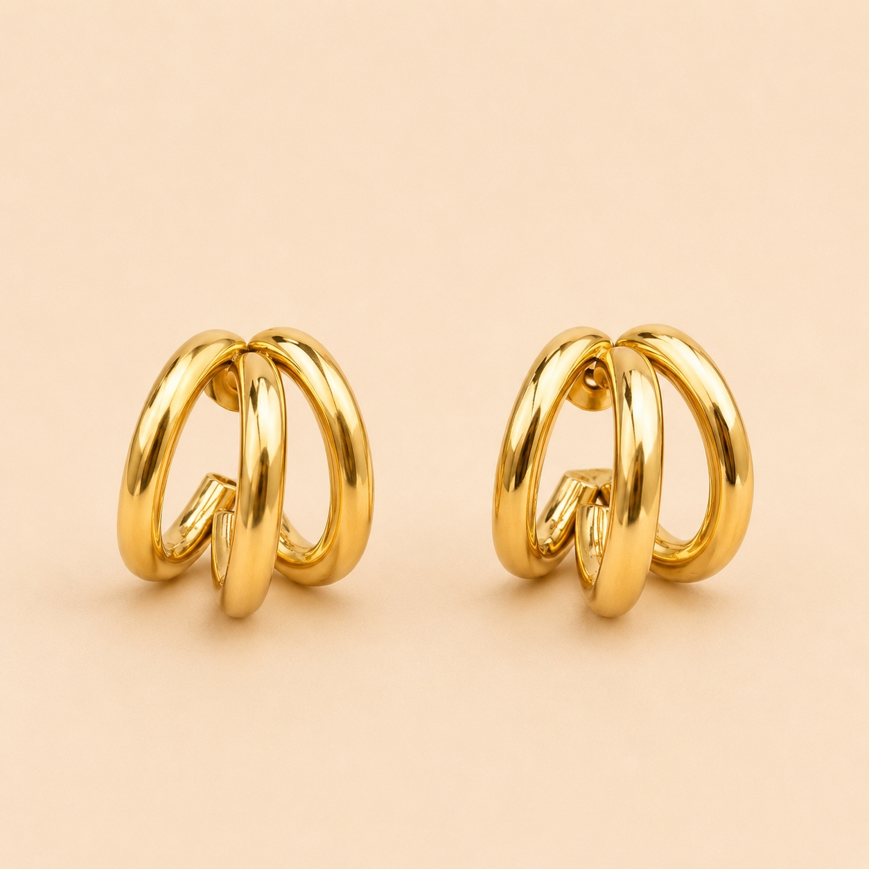 ✨ Boucles d’Oreilles Signature Dorées ✨
